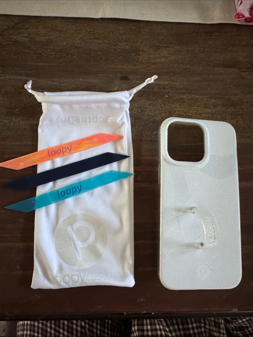 Loopy Case White Sparkle iPhone 15 Pro Max with Orange, Navy, Clear& Teal Straps